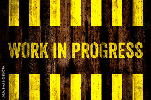 Work In Progress Warning Sign With Yellow And Black Stripes