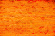 © fewerton - Orange brick wall with red  brick detail as seamless surface texture background.
