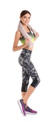 Wall Mural - Beautiful young woman in sportswear with towel on white background