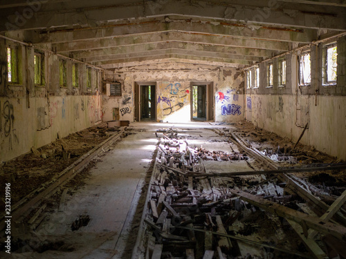 Abandoned Bowling Alley With Destroyed Wooden Floor In Old
