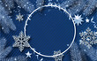 Blue Christmas and New Year shiny poster with snowflakes and fir branches.