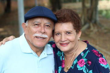 Lovely senior Hispanic couple close up 