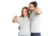 © A Stock Studio - It is no. Two young people gesturing rejection. Couple man and woman not disagree, they put a symbol of denial in their hands.