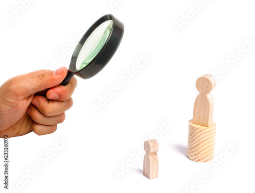 Fotografia, Obraz Magnifying glass is looking at the men stands on the podium and broadcasts his thoughts and ideas to listeners