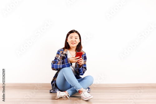 Portrait Of Beautiful Asian Young Woman With Brunette Hair And Bob
