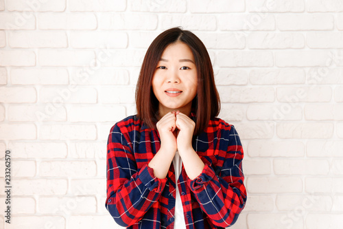 Portrait Of Beautiful Asian Young Woman With Brunette Hair And Bob