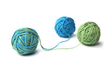 Wall Mural - colorful cotton thread ball from two color green and blue thread isolated on white background. diffe