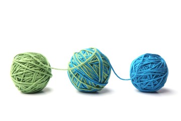 Wall Mural - colorful cotton thread ball from two color green and blue thread isolated on white background. diffe