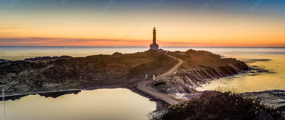 Favaritx Lighthouse in Minorca, Spain. - obrazy, fototapety, plakaty 
