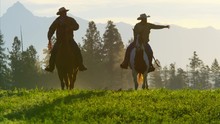 Cowboy Riders Galloping Forest Wilderness Area Canada