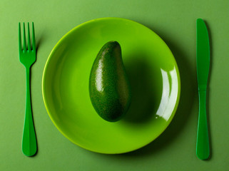 avocado fresh green vitamin background plate fork knife