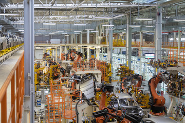 body of car on conveyor top view. Modern Assembly of cars at the plant. The automated build process of the car body