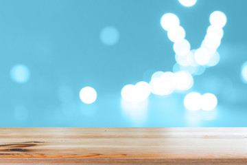 Canvas Print - wooden desk with blue gradient tone abstract background bokeh circles for christmas background