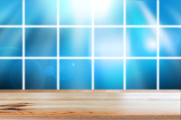 Canvas Print - wooden desk with blue gradient tone abstract background bokeh circles for christmas background