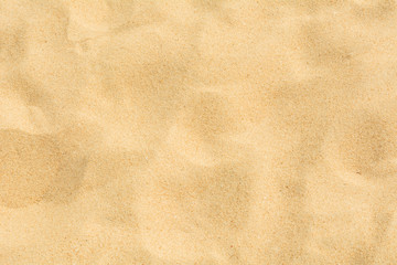 Sticker - Texture of beach sand as background.