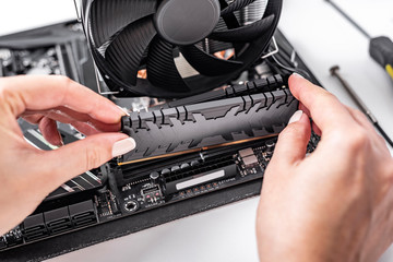 Poster - Installing random access memory into PC.