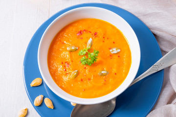 healthy pumpkin soup with ginger carrots and coconut milk