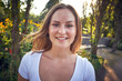 © Westend61 - Portrait of a smiling, pretty woman in summer
