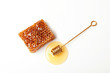 Composition with fresh honeycomb on white background, top view