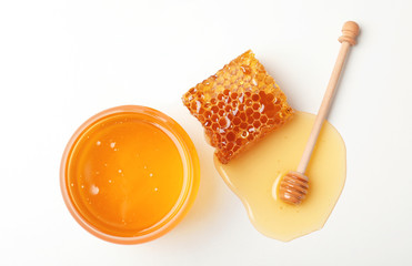 composition with fresh honey on white background, top view