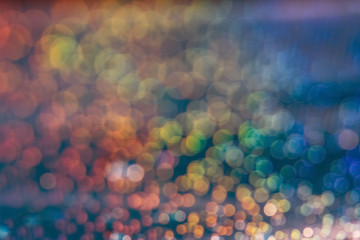 Wall Mural - Multicolored abstract bokeh background. Festive beautiful blurred background, blue, aquamarine, green, red,yellow.