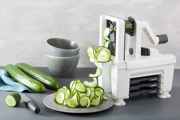 spiralizing cucumber vegetable with spiralizer