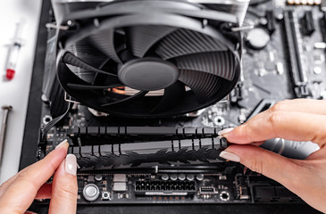 Poster - Installing random access memory into PC.