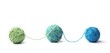 Colorful cotton thread balls from two color green and blue thread isolated on white background. Different color green and blue thread mix.