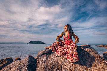 Wall Mural - beautiful young gypsy style woman outdoors