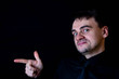 © Павел Прохацкий - white male black background funny face finger pointing
