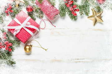 christmas background with fir tree, present box and decorations