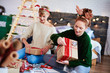© gpointstudio - Friends preparing christmas gifts for Christmas