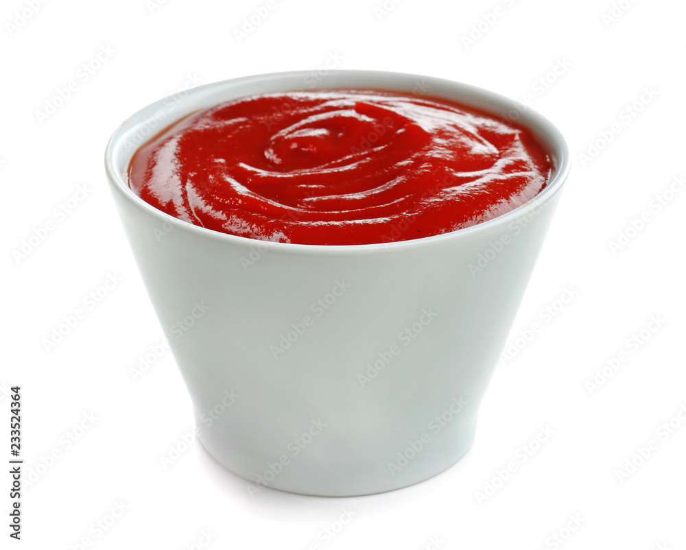 Tasty tomato sauce in bowl on white background