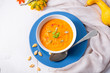 healthy pumpkin soup with ginger carrots and coconut milk