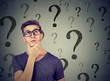 © pathdoc - Thoughtful confused man has too many questions and no answer