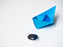 Blue Paper Boat With Compass