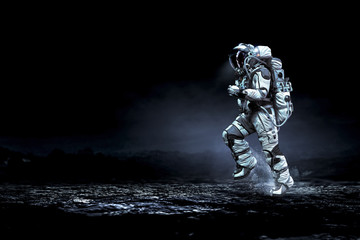 Wall Mural - spaceman running fast. mixed media