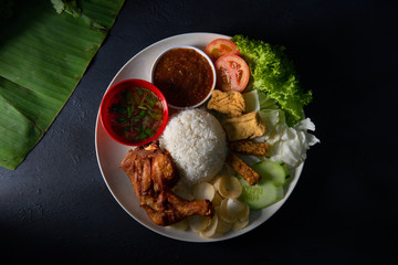 Poster - nasi lemak kukus with drumpstick top down view