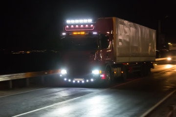 Wall Mural - truck moves on highway at night