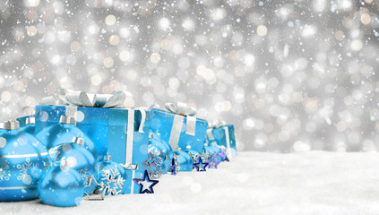 Blue christmas baubles and gifts lined up 3D rendering