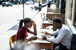 © Rawpixel.com - Couple reading the menu at a cafe