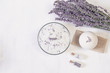 Natural herbal sea salt with aromatic lavender - perfect for relaxation. Cosmetic jars and bottles with salt, lavender flowers, bath bomb