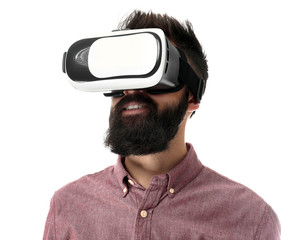 Wall Mural - Man wearing virtual reality glasses on white background