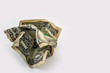 Crumpled One Doller bill isolated on a white background