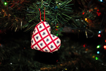 Handmade Fabric Heart Christmas Ornament Hanging on the Tree