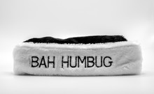 Fur Hat Brim Saying Bah Humbug In Black And White Isolated On A Solid Background