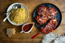 Overhead View Of Veal Parmigiana Served On Plate