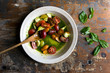 © Andrew Scrivani - Overhead view of tomato and mozzarella salad served on plate