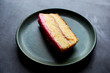 © Andrew Scrivani - Close up of rhubarb vanilla pound cake slice served on plate