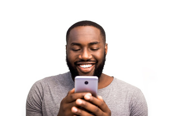 african american black user holding mobile smart phone near face, looking new app in online store. c